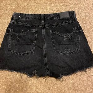 Black distressed shorts
